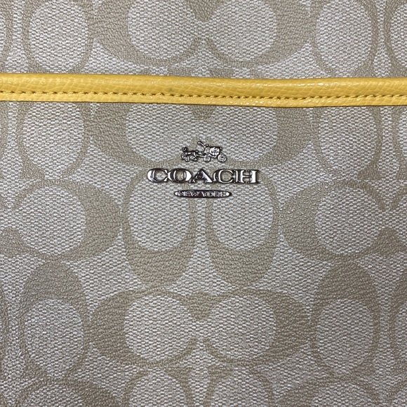Yellow accented Coach cross over bag. Long adjustable shoulder strap. - Picture 2 of 5